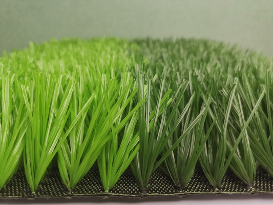 ΚΙΝΑ UV ανθεκτική πράσινη 50mm τεχνητή χλόη για το αγωνιστικό χώρο ποδοσφαίρου προμηθευτής